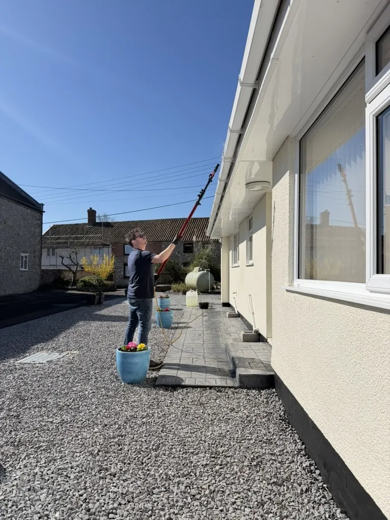 Jason cleaning a fascia from the ground